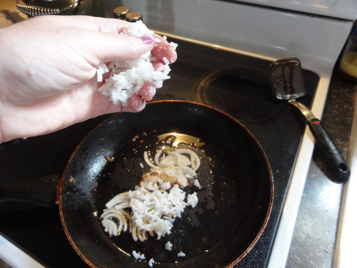 Crumble the rice into the pan with your hand.