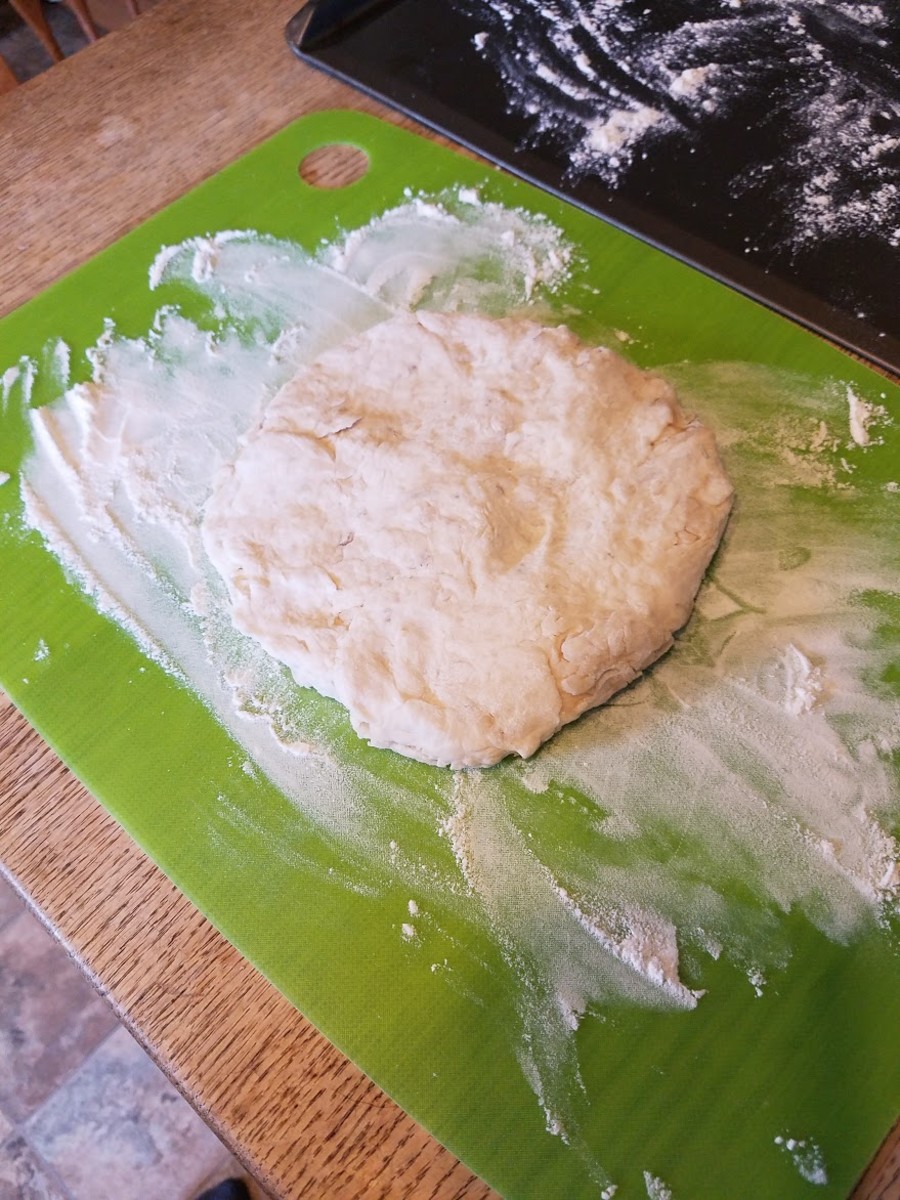 Put your ball of dough onto a heavily floured surface. 