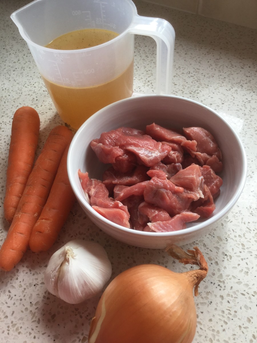 Basic ingredients of lamb hotpot Leg of lamb, onions, carrots, stock, carrots, and potatoes