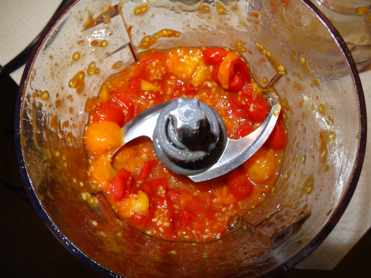 Place jalapeño peppers in a food processor and pulse for 1–2 seconds. Add tomatoes and pulse for another 1–2 seconds.