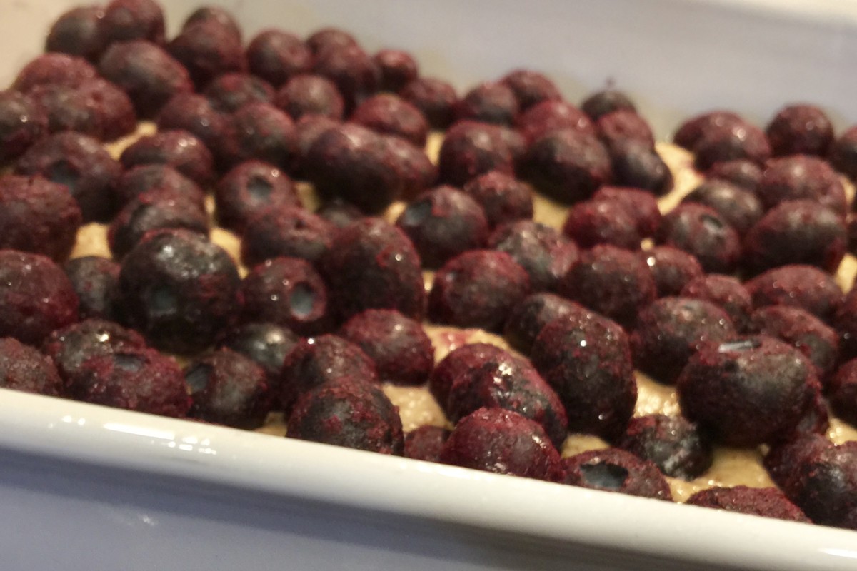 To ensure even baking, make sure to "sprinkle" blueberries evenly, including the edges.