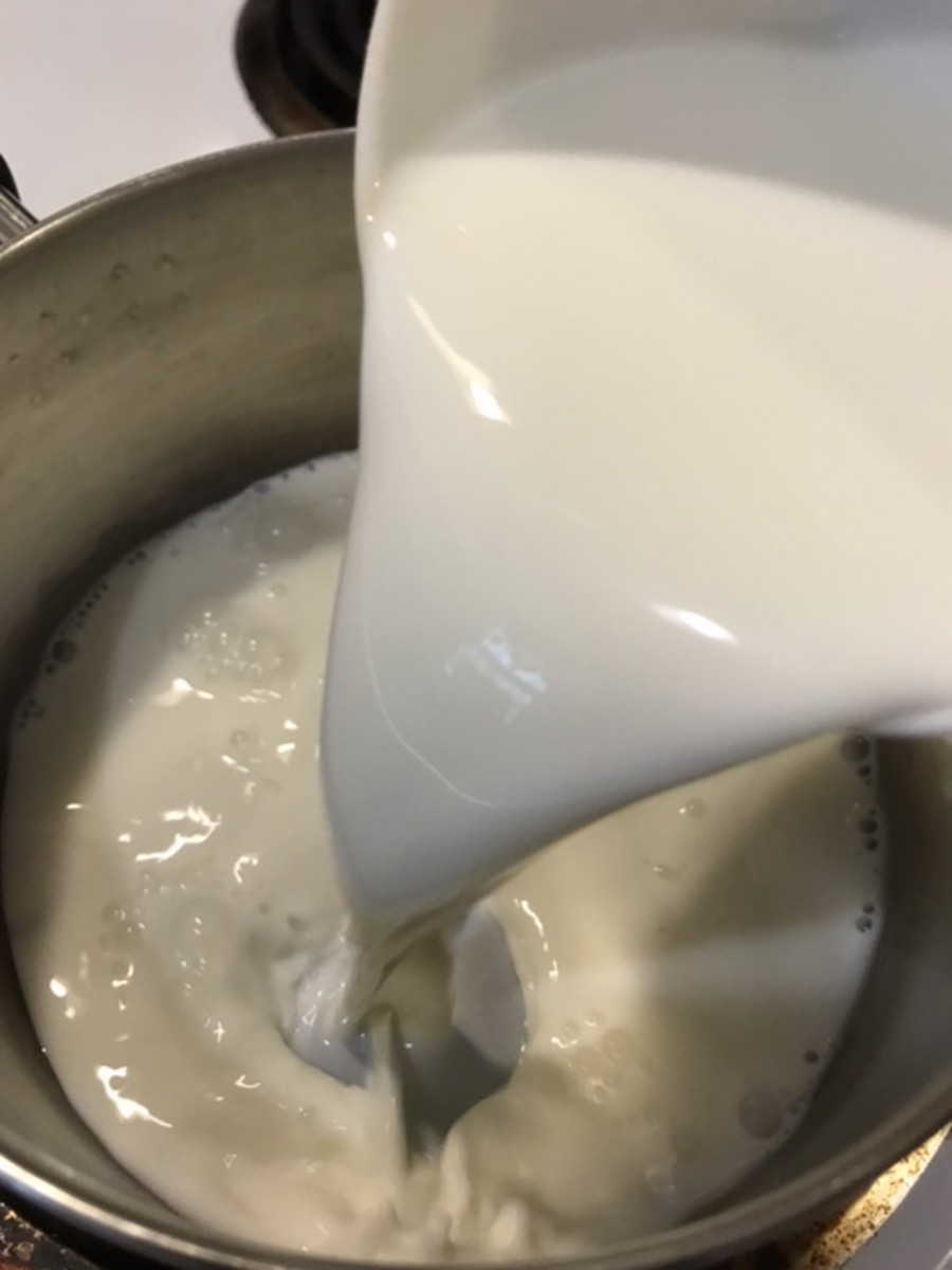 Cook the milk and flour. Heating the milk and flour to boiling cooks off the raw flour taste, and brings out the thickening power of the flour. It should get a pudding-like consistency.