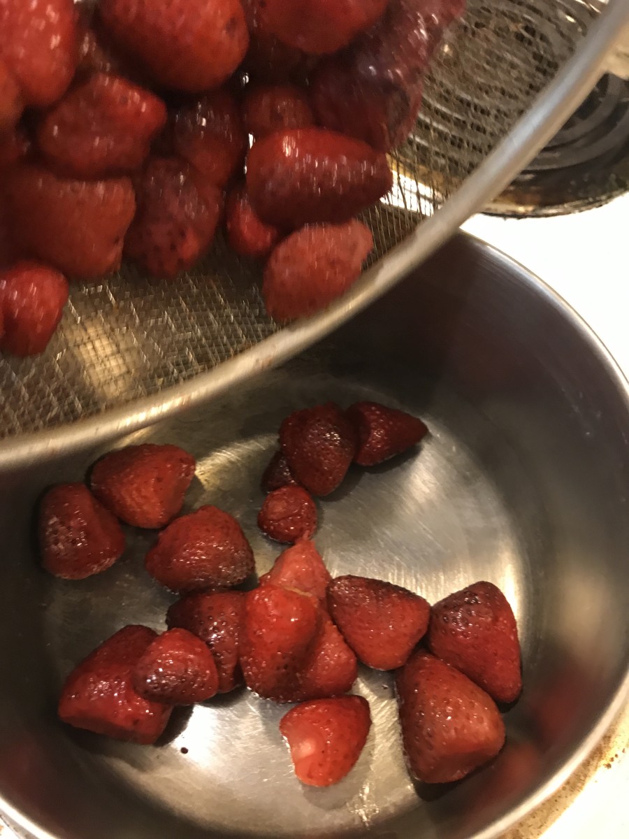 You only need a small saucepan for this strawberry sauce—place the whole berries into it and use medium heat. Don't even bother slicing the berries - you'll crush them as they cook, so save yourself a step.