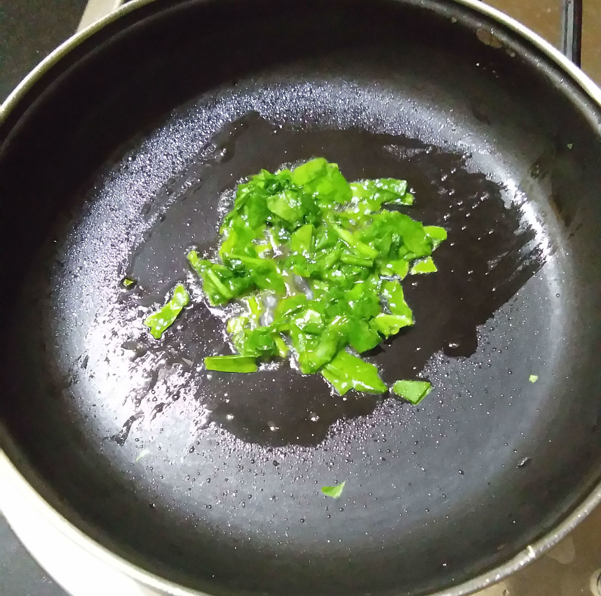 Step two: Sauté the chopped spinach in butter till it becomes crispy.