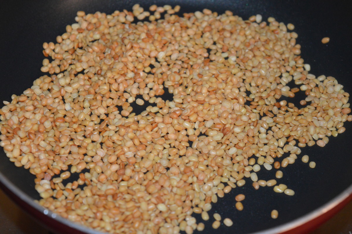 Step 2: Roast white lentils till golden brown. Add it to the roasted chickpea split.