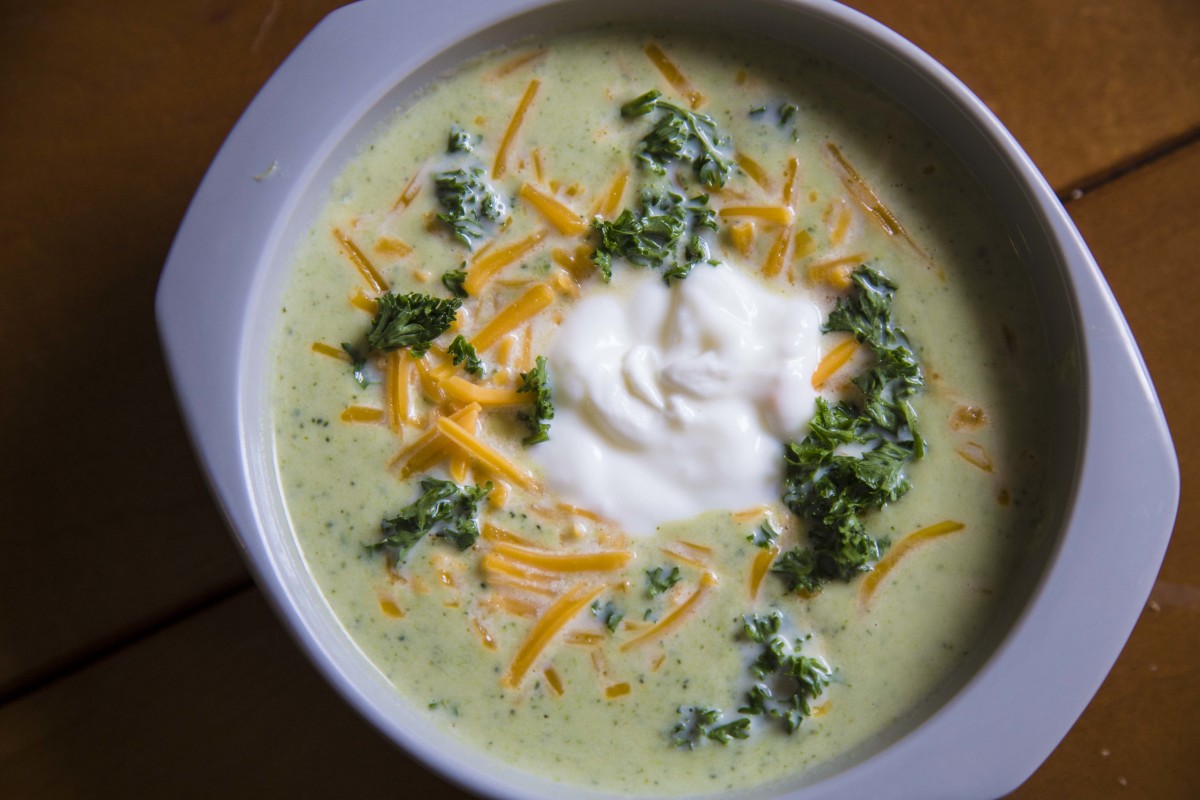 I topped my soup with parsley, cheddar cheese, and yogurt.