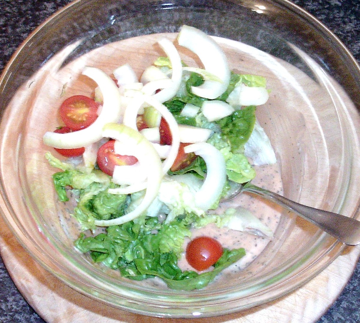 Salad components are added to sauce