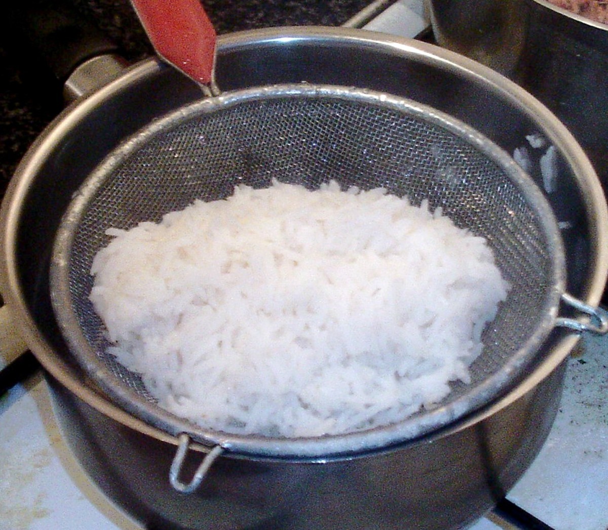 Rice is drained and left to steam off for a few minutes.