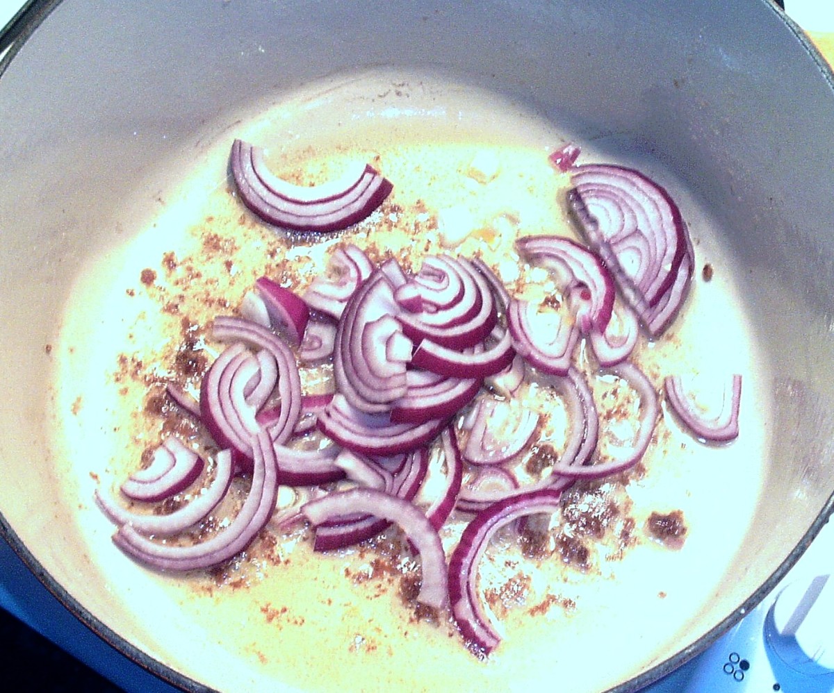 Red onion is sauteed in Dutch oven