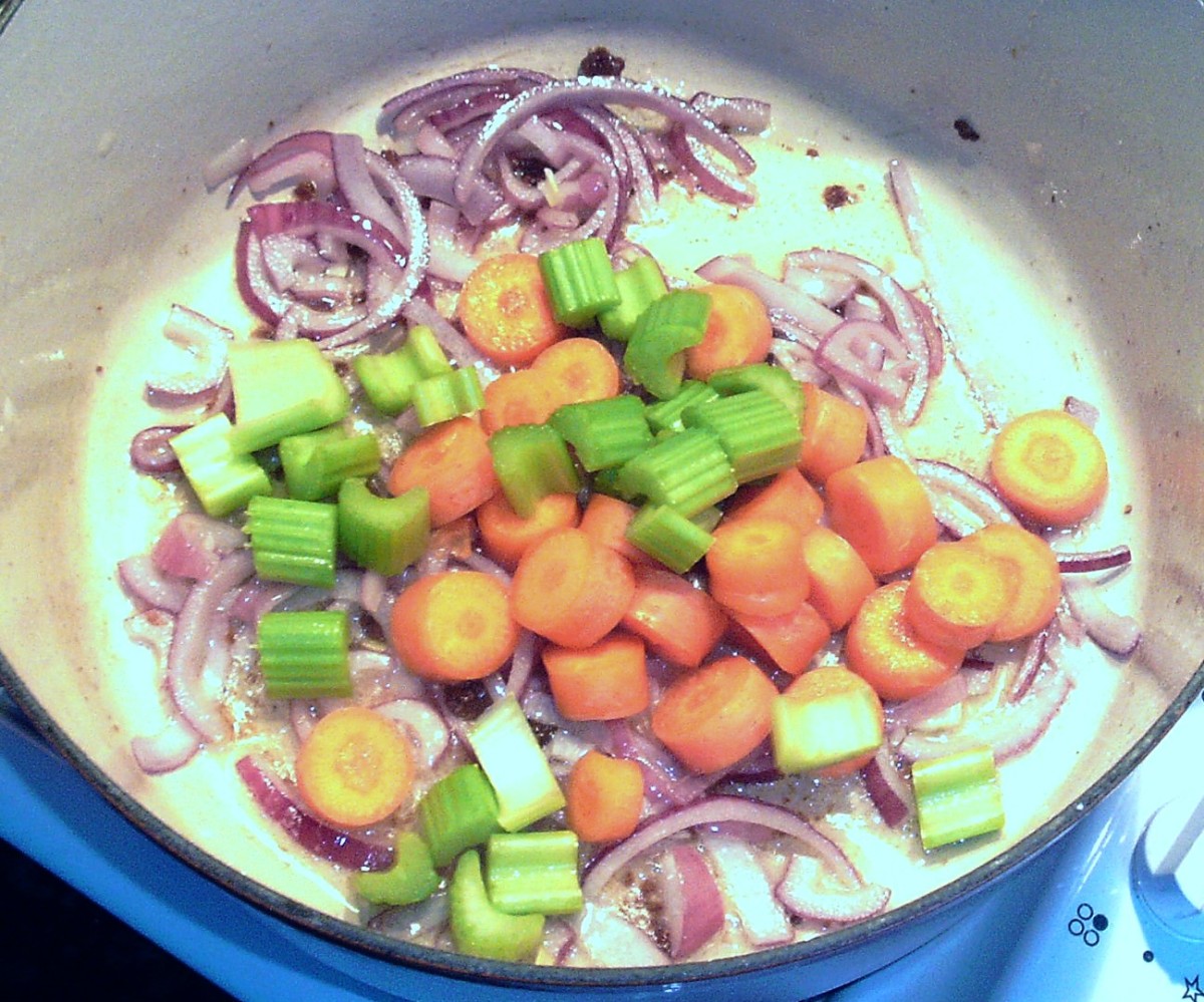 Carrot and celery are added to sauteed red onion