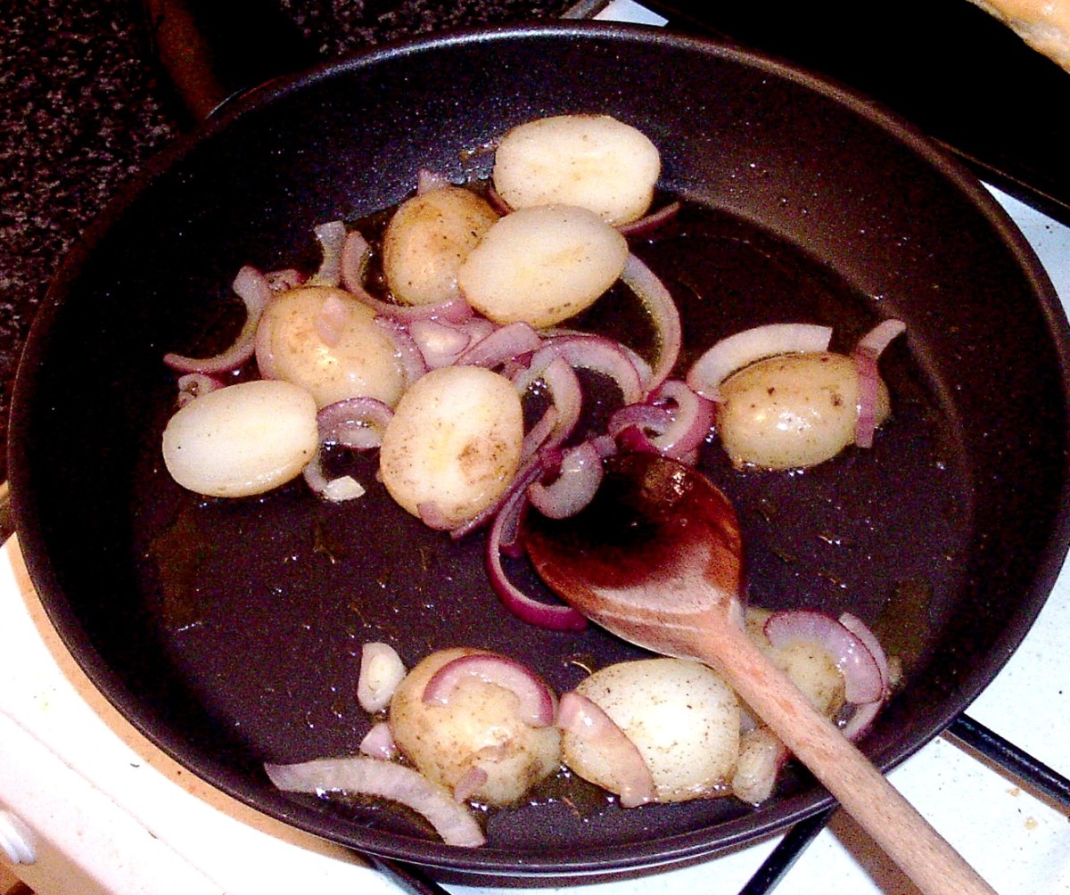Potato and onion are briefly sauteed over a medium high heat