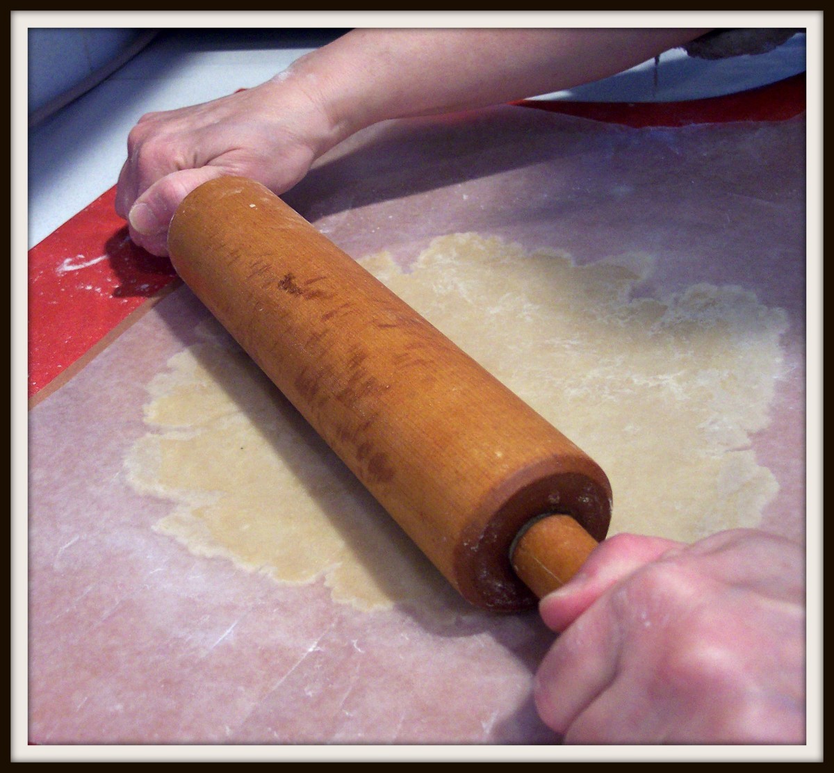 One way to roll out the dough is to roll it between two sheets of floured wax paper.