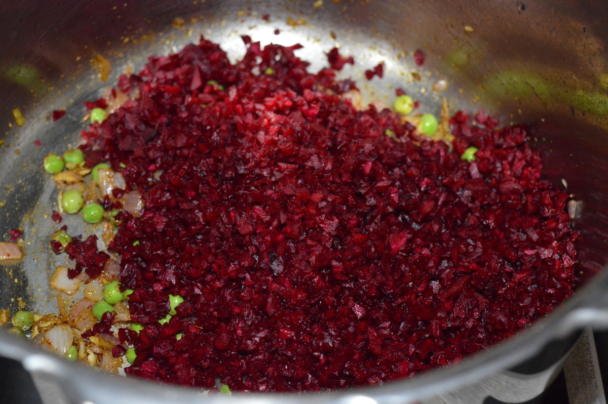 Step six: Add chopped beetroot. Stir-cook the mix for about 3 minutes. 