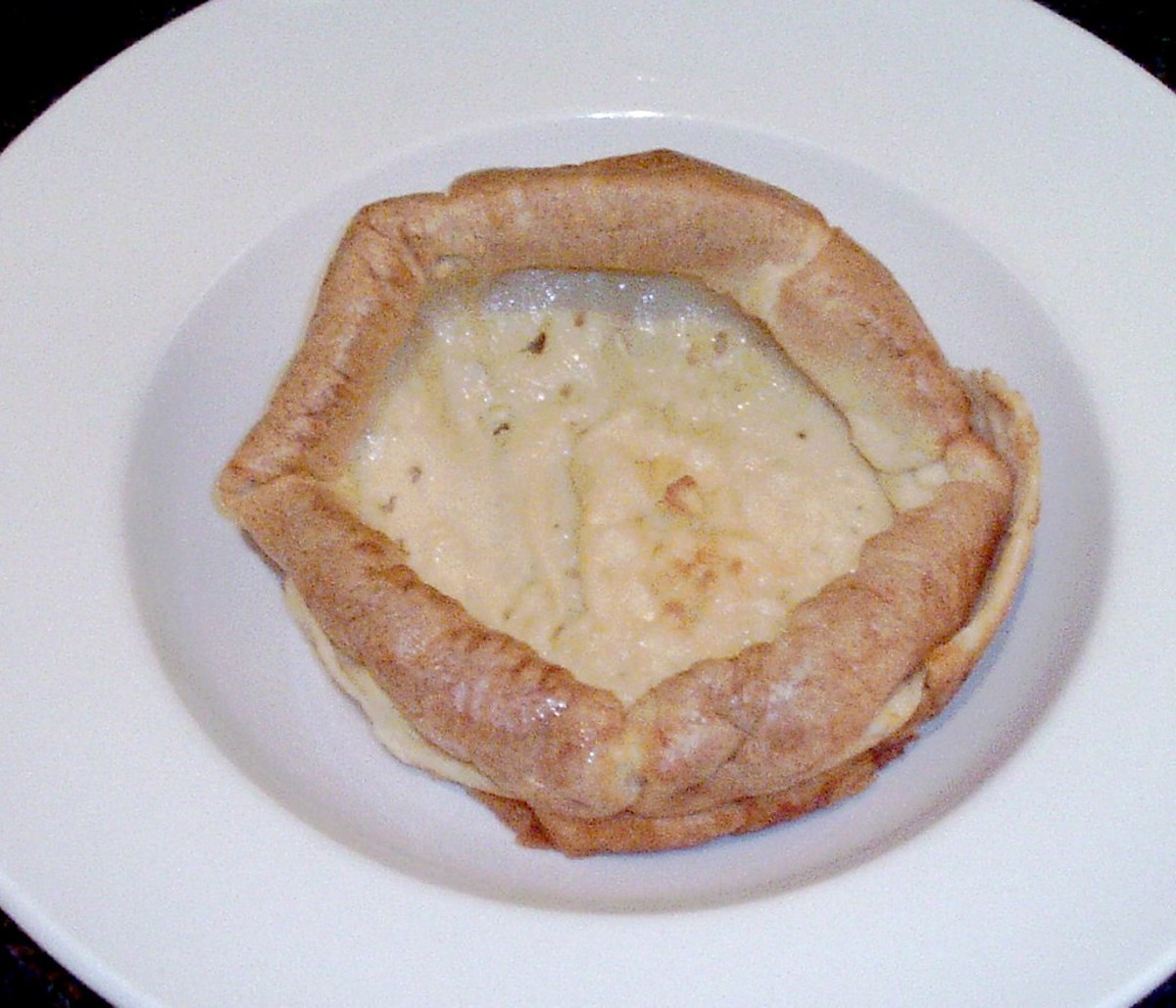 Yorkshire pudding is lifted on to serving plate