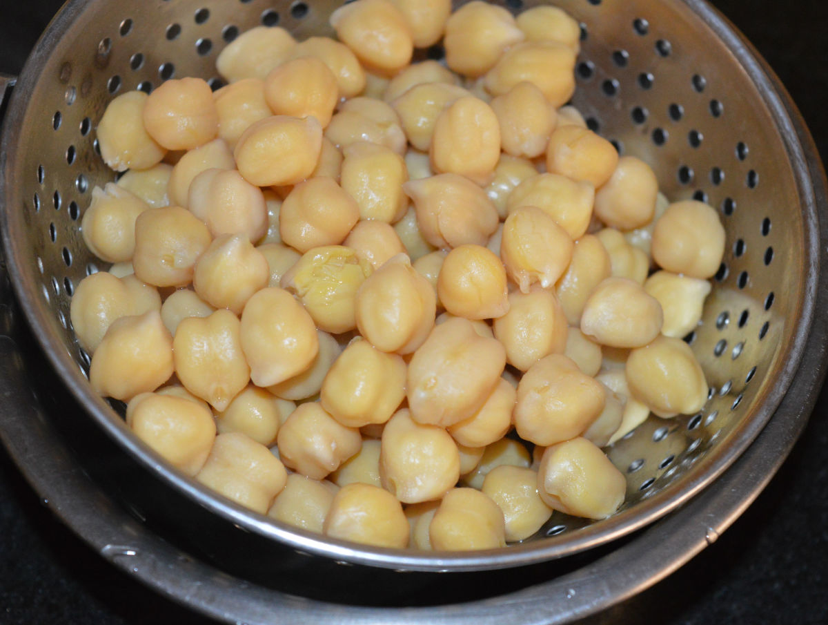 Cooked chickpeas. Strain them. Reserve the water.