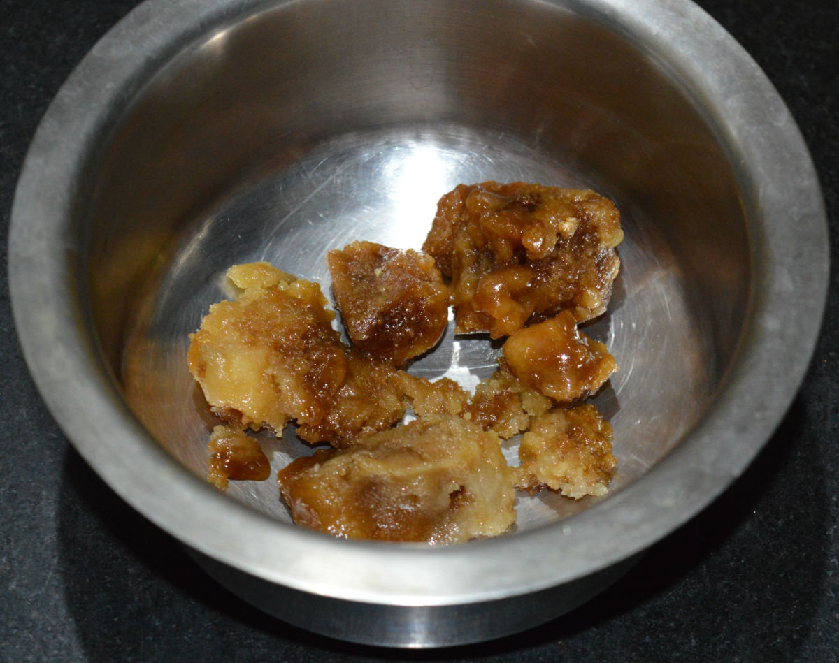Step one: Put powdered jaggery in a bowl. Add warm water to it. Stir well.