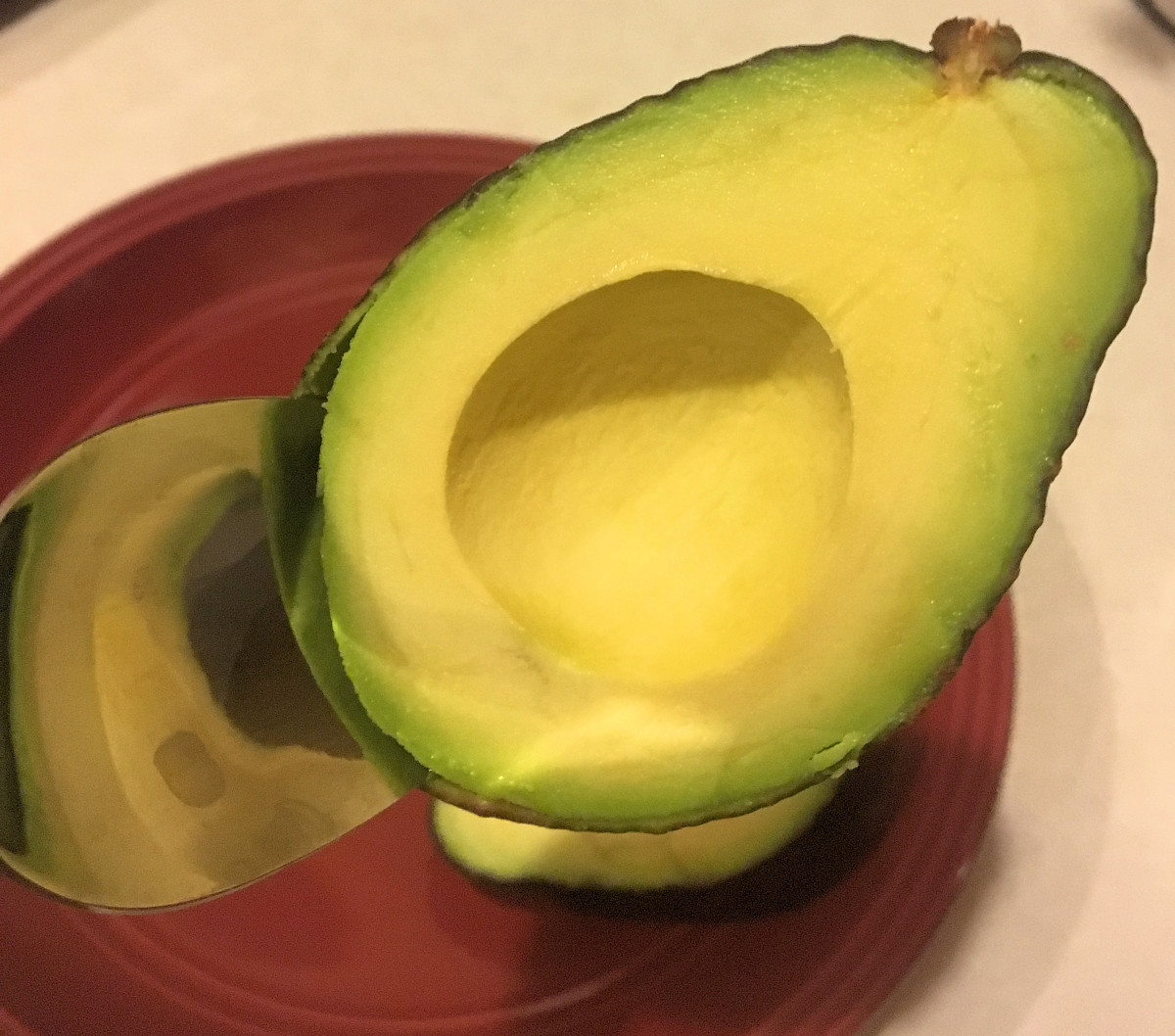 Removing avocado flesh from skin