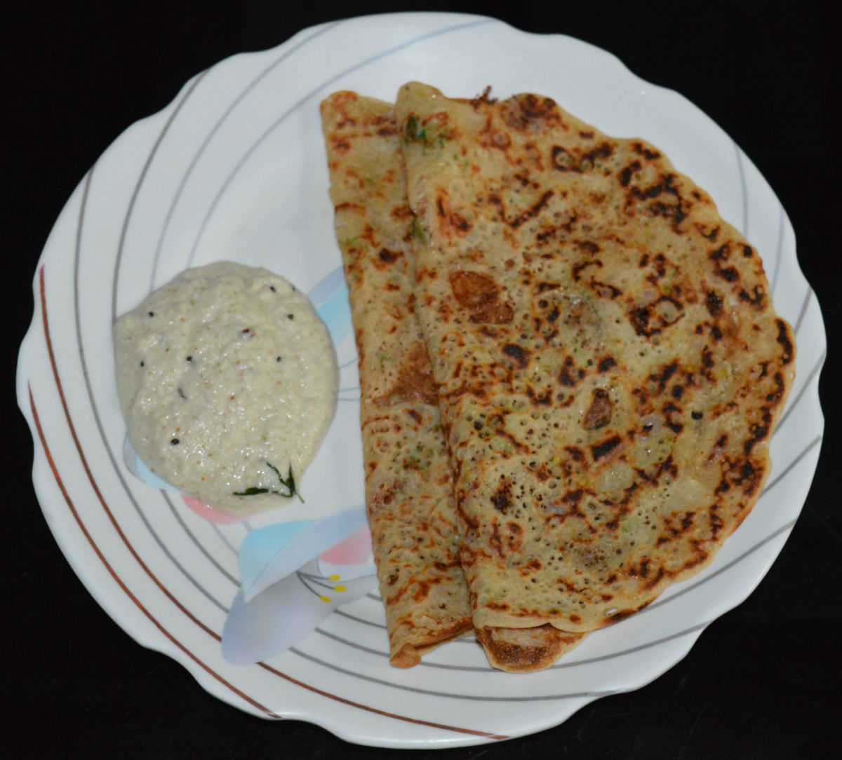 Step six: Remove it when both the sides are golden brown. Repeat the same steps for making all the pancakes. Serve them with coconut chutney or tomato sauce. Enjoy the taste!