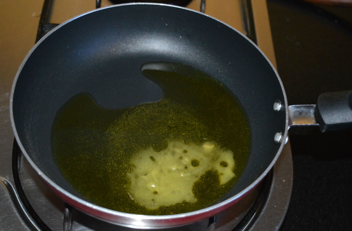 Step two: Heat ghee in a pan. I used a non-stick pan. Keep the heat medium-low.