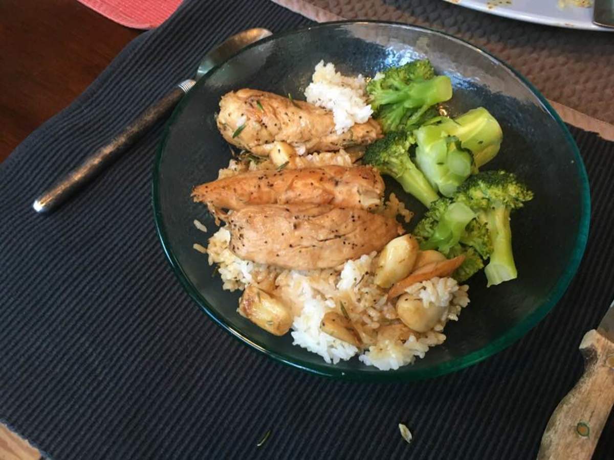Sautéed chicken with garlic and rosemary, served on top of rice