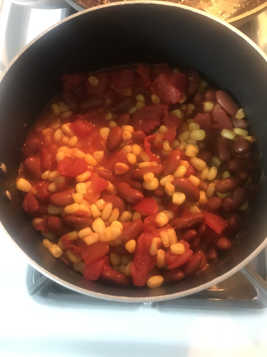 The sauce: tomatoes, corn, and pinto beans.