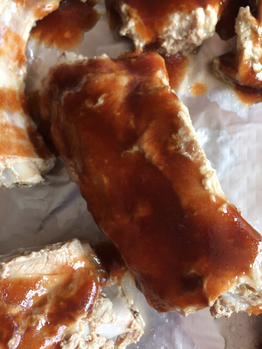 Coat the cooked ribs in the bbq sauce mix