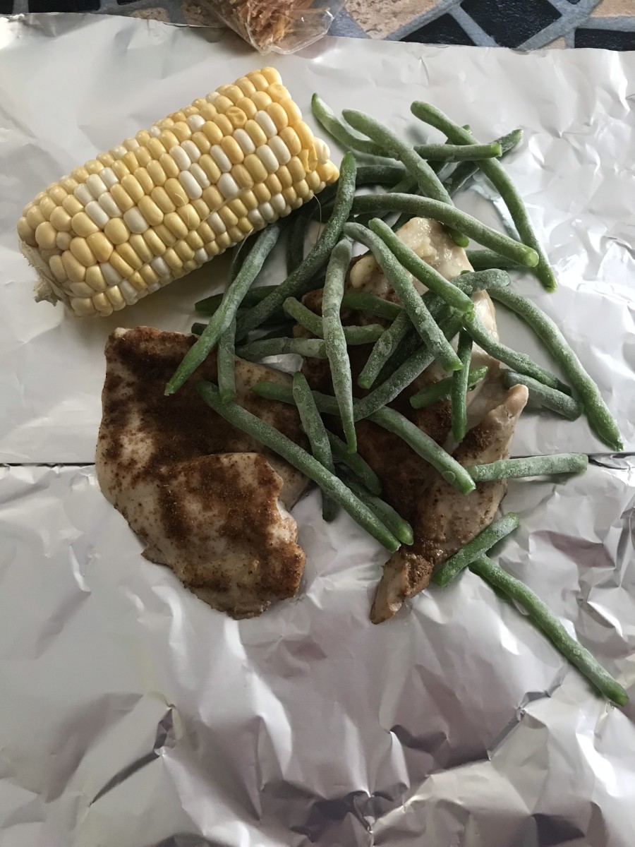 Chicken with green beans and corn before cooking.