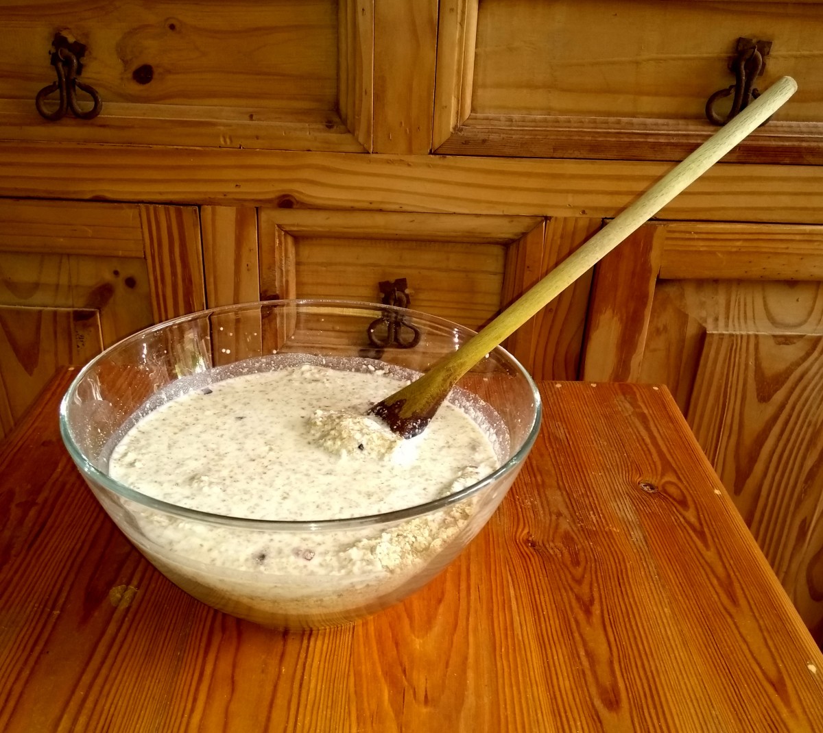 After dry mixing, add the curdled milk or buttermilk and stir thoroughly with a wooden spoon.