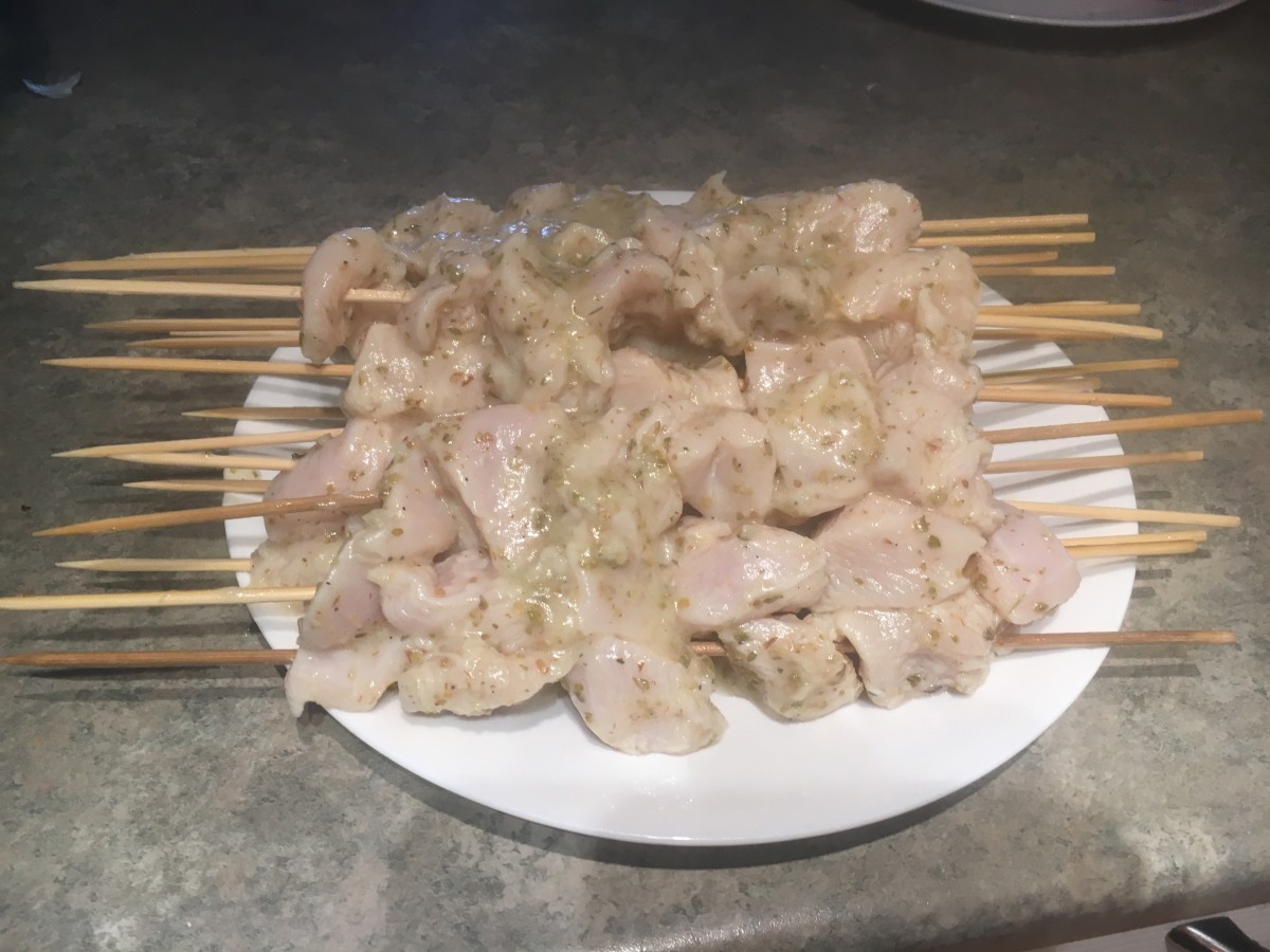 Place 5 to 6 chicken cubes on each skewer.