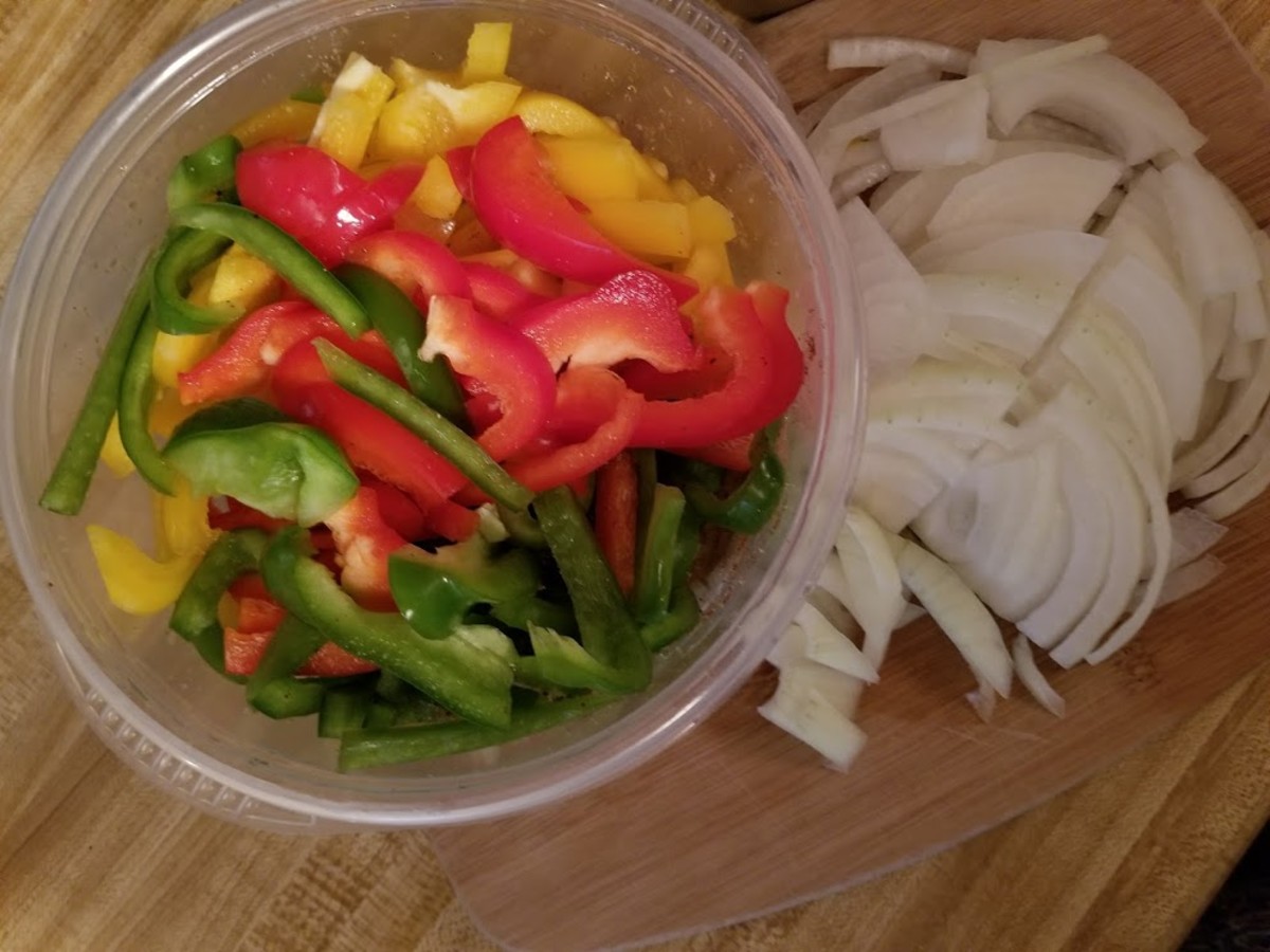 Slicing onions, yellow, red and green peppers