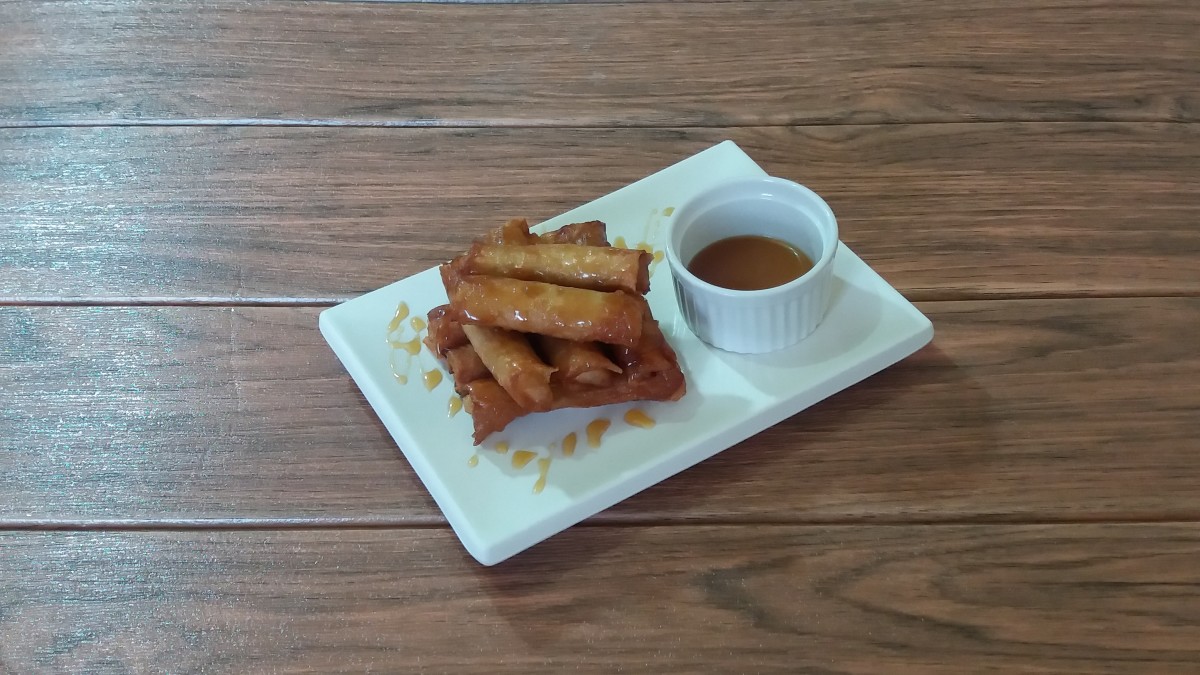 Fried banana egg rolls with salted caramel sauce