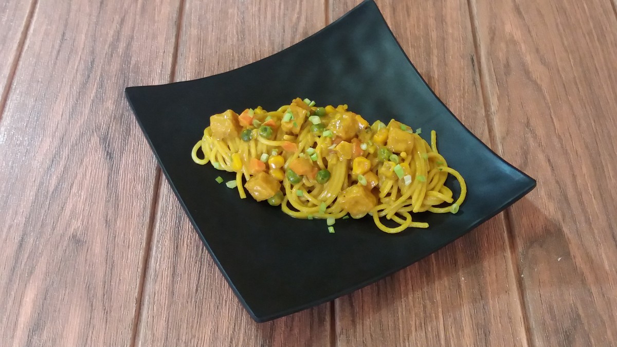 Spaghetti with curried tofu and mixed vegetables