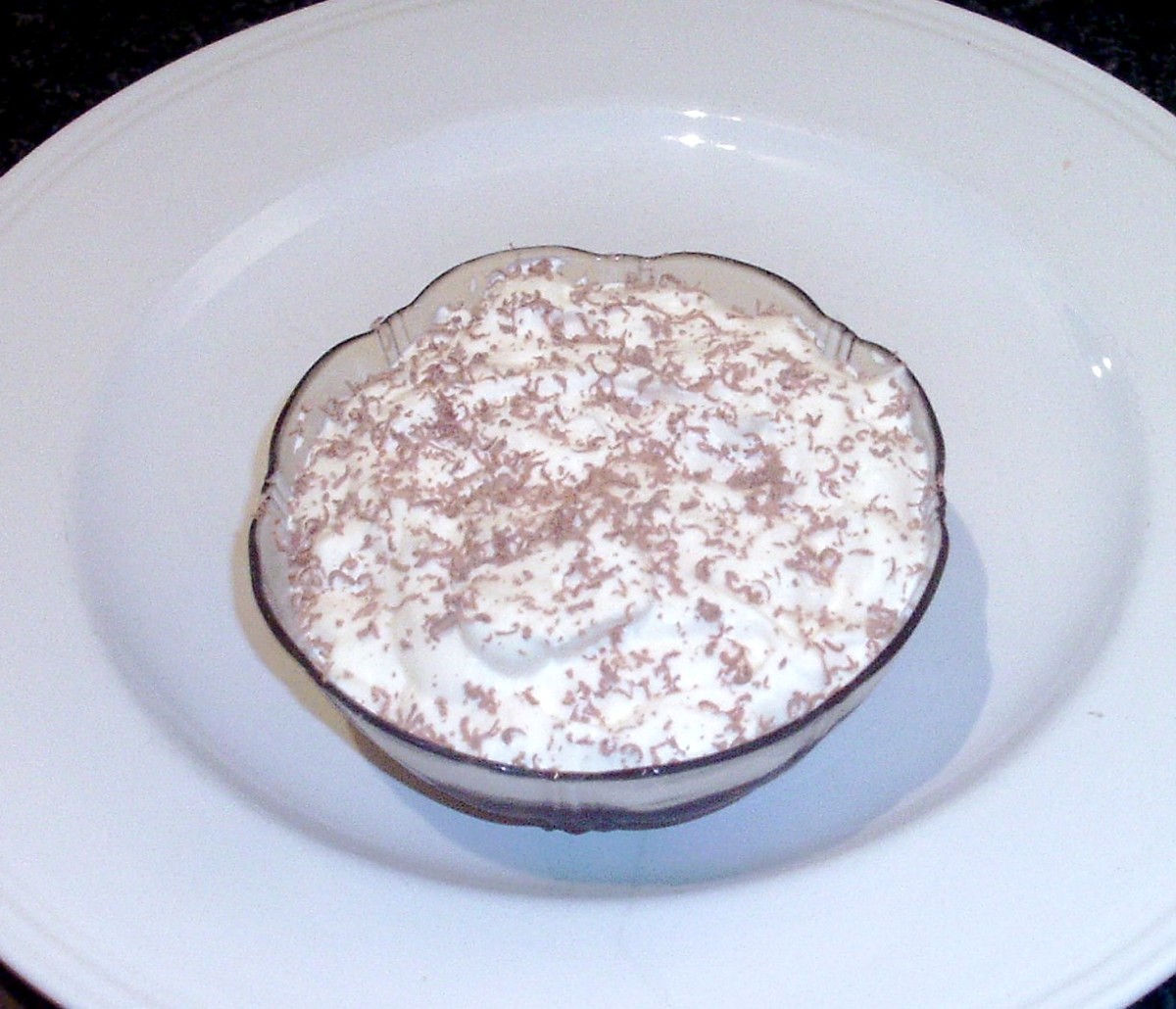 Coffee, Mincemeat and Sponge Cake Jelly, Topped With Fresh Cream and Chocolate Shavings