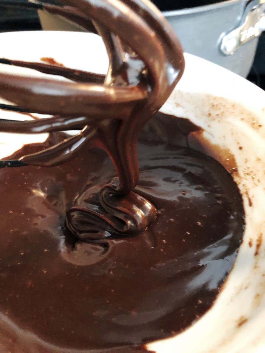 Make the chocolate glaze by using the double boiler technique. 