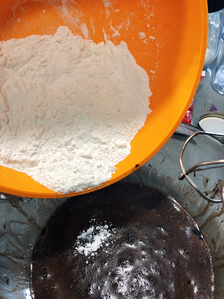 Add the flour mixture into the mixing bowl. 