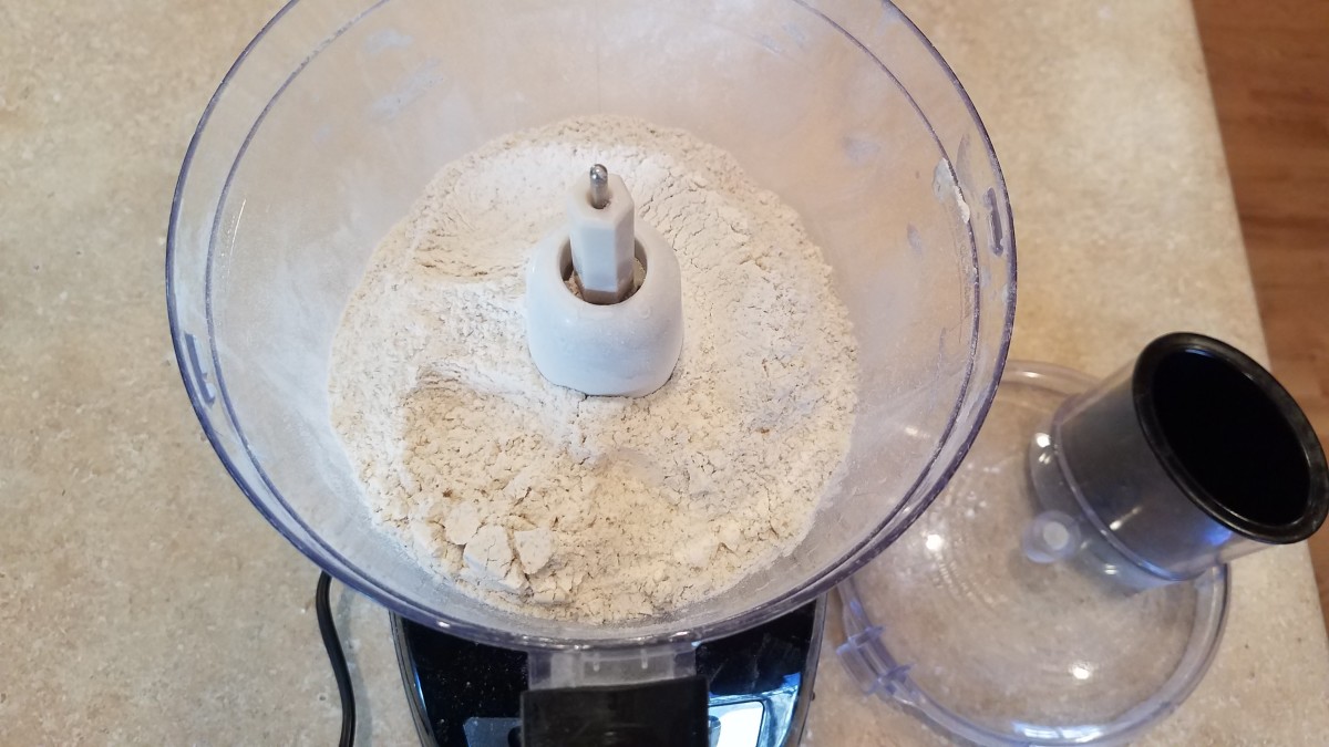 Pour your flour into the food processor.
