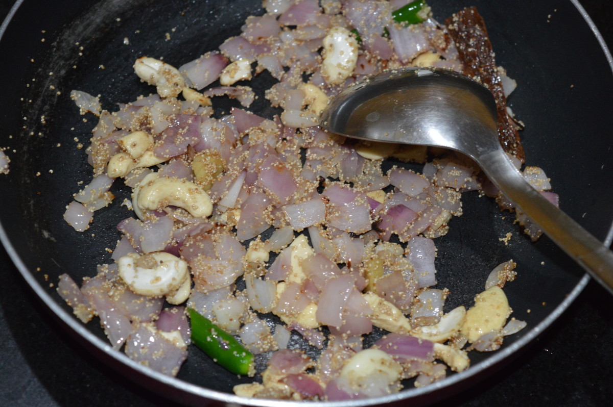 The sauteed ingredients are ready to grind into a paste.