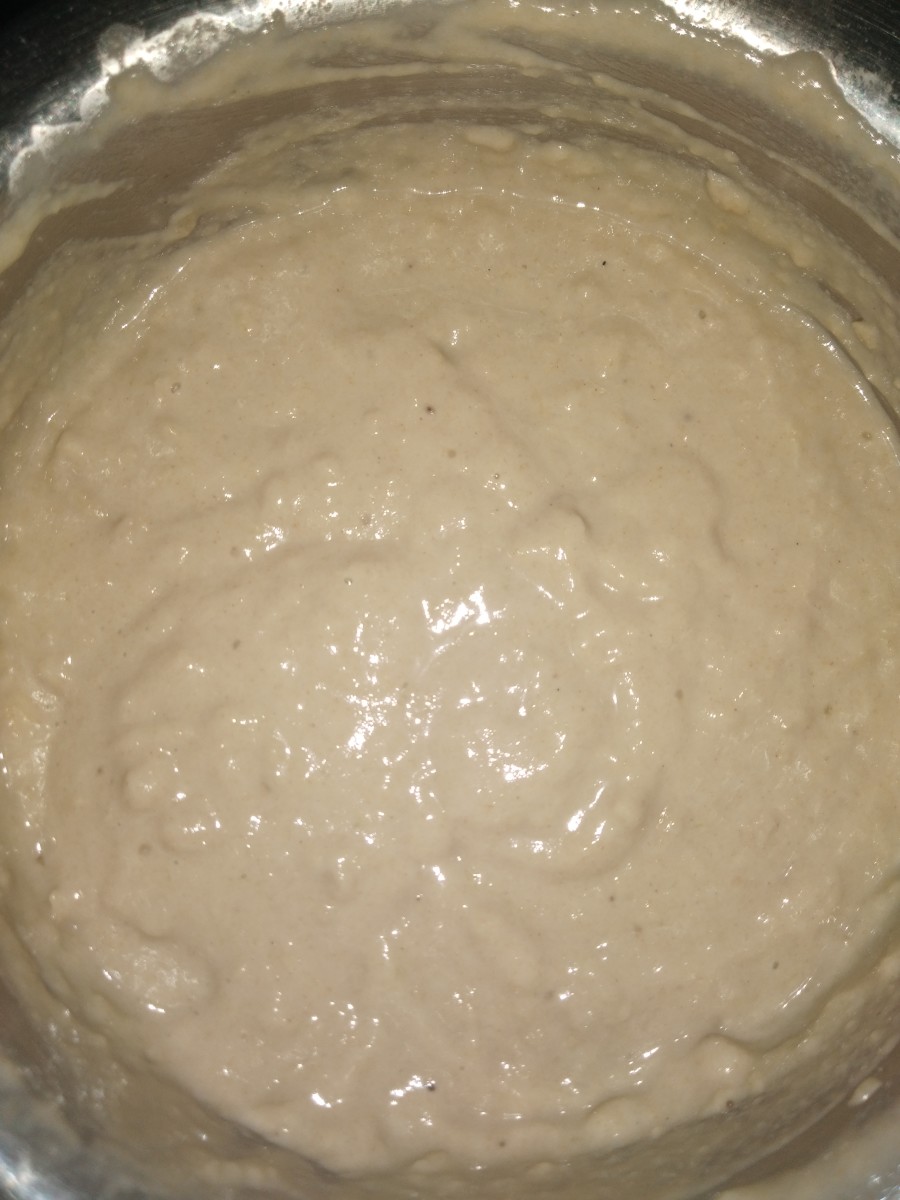 Add apple-banana paste to wheat flour. Mix. Add a 1/4 cup of milk to form a semi-thick paste of dropping consistency.