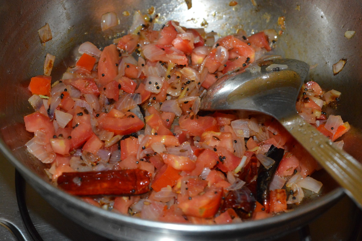 Step three: Throw in the chopped tomatoes. Cook over medium flame for 2-3 minutes.