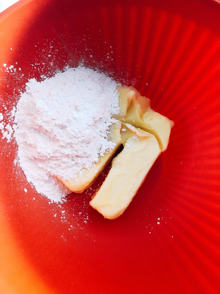 In a mixing bowl, combine the butter, sugar, and vanilla. 