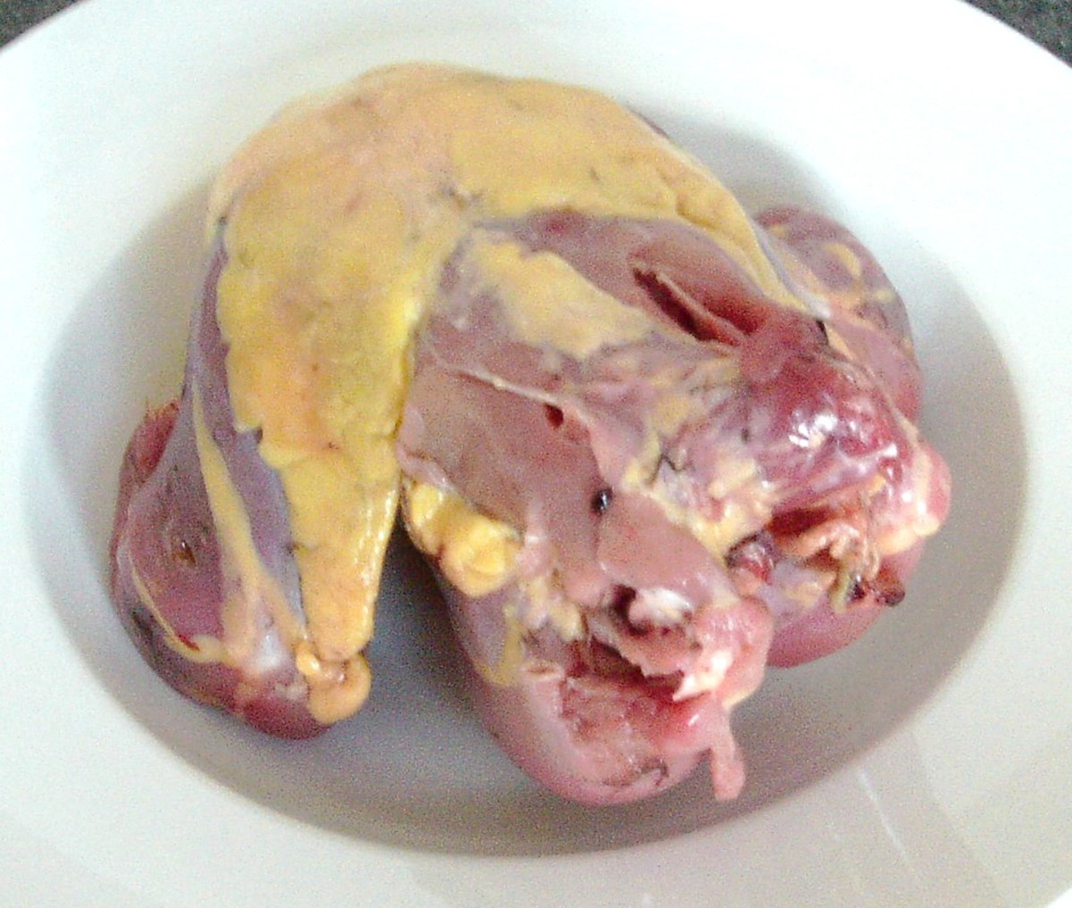 Hung and skinned pheasant