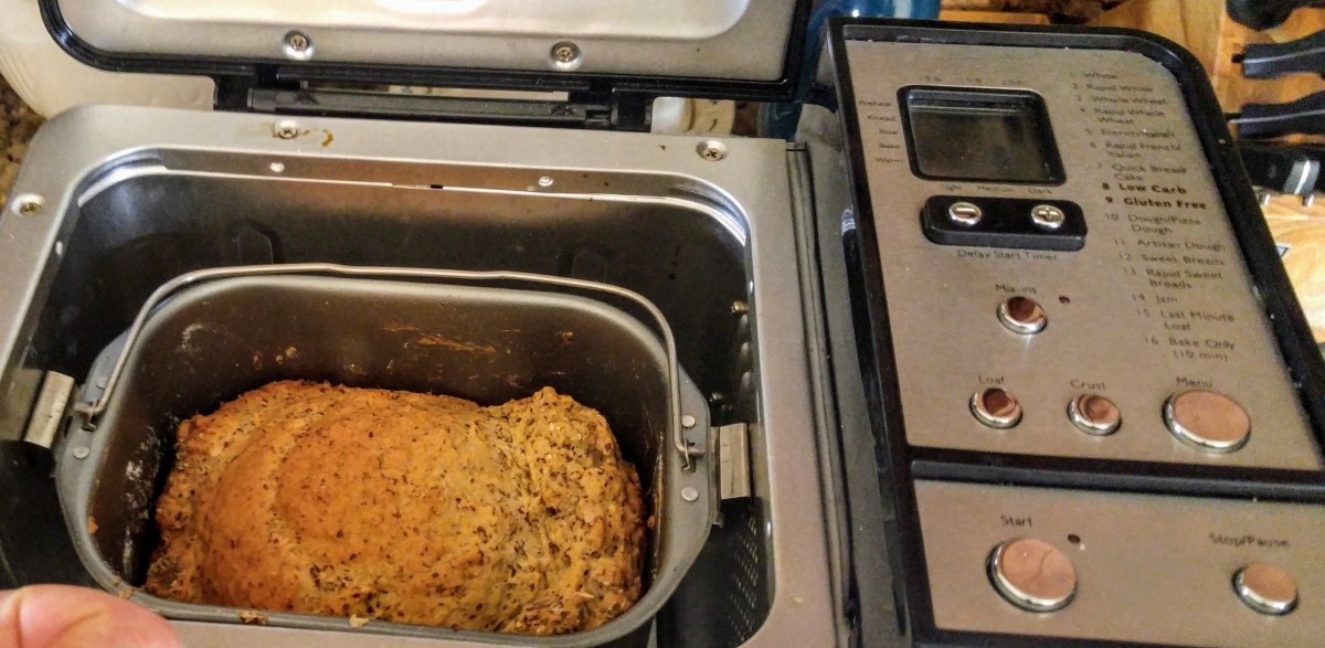 Removing the baked loaf from the bread machine