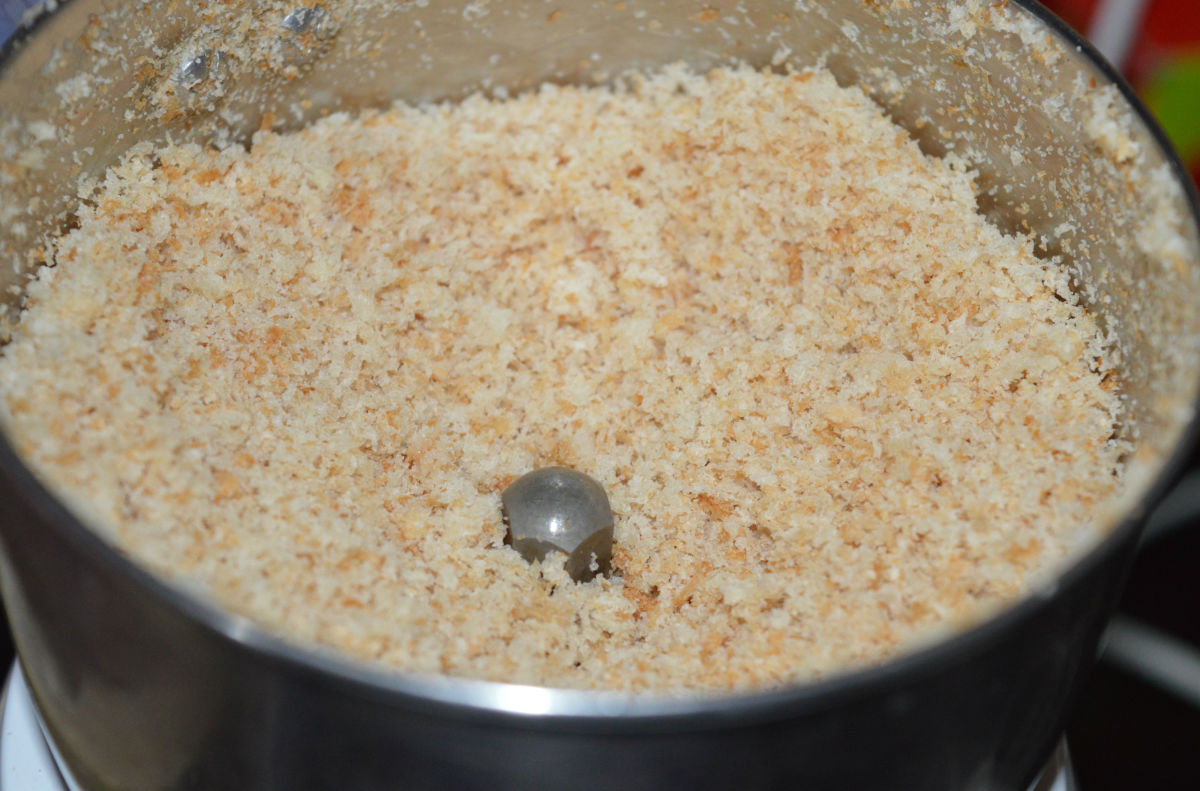 Step two: If you don't have bread crumbs, you can made your own. Add bread slices to a mixer. Pulse to get bread crumbs.