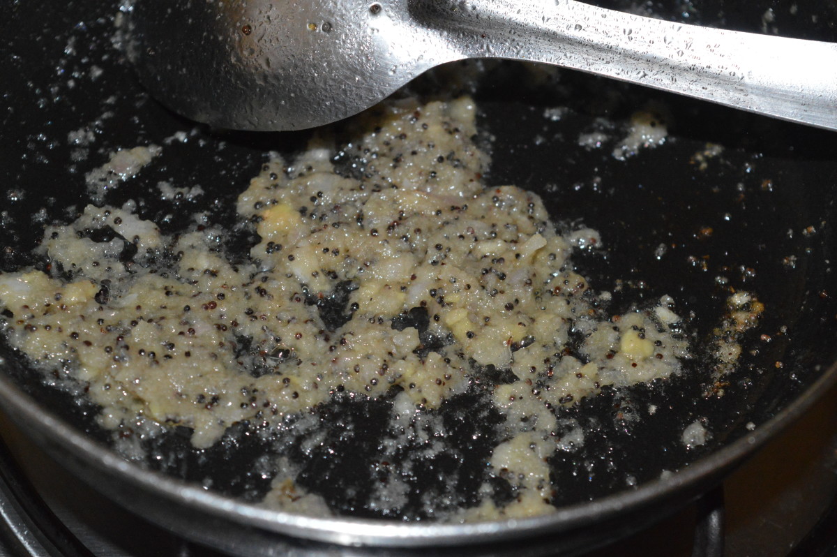 Step one: Saute the mustard seeds in oil until they crackle. Stir in the ginger-garlic-onion paste. Saute it for 2 minutes or until you experience a nice aroma from the roasted paste.