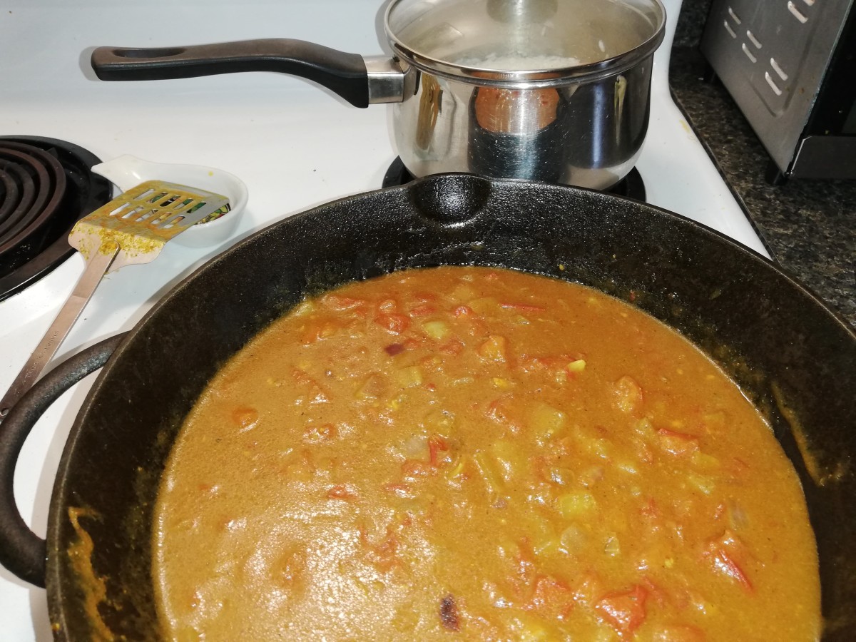 Curry sauce and pot of rice