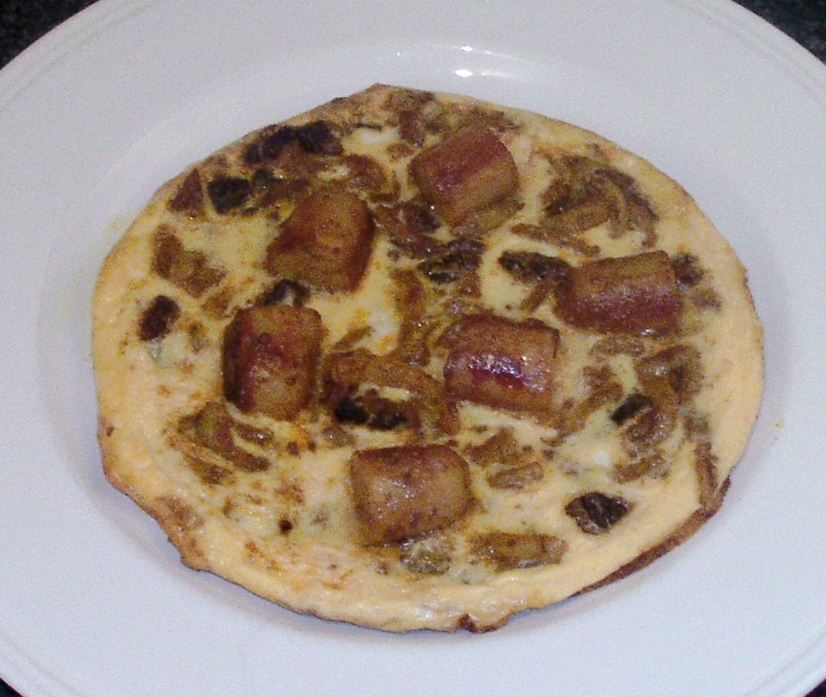 Curried chicken sausages in a Spanish style tortilla