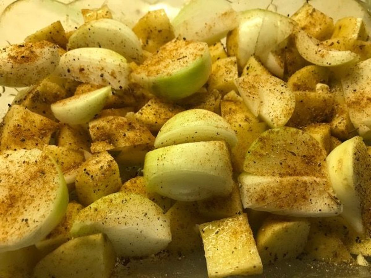 Baked Potatoes With Onion, Garlic, and Parmesan Cheese Delishably