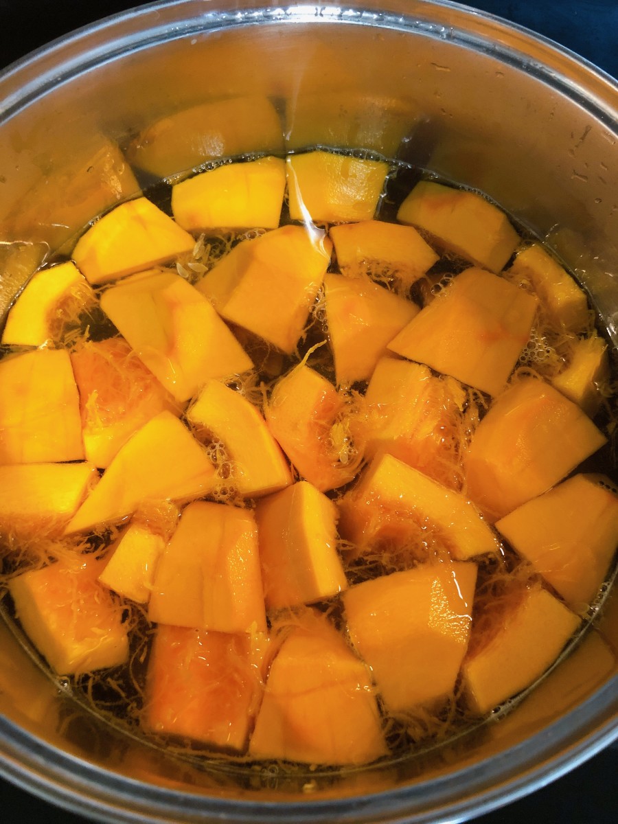 Cut the pumpkin into chunks and throw them into a pot filled with water. 