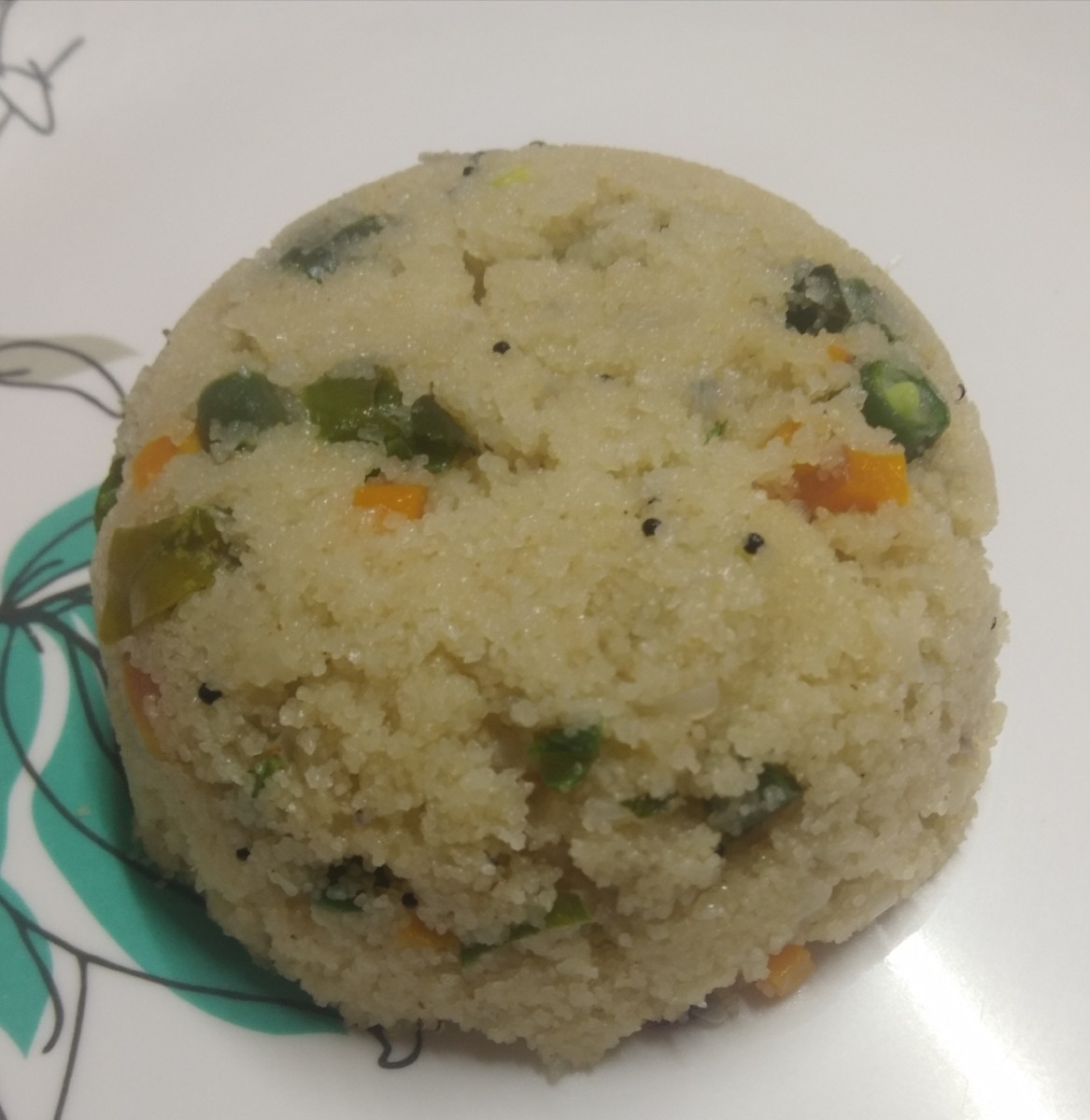 Soft, yummy vegetable upma is ready to eat.