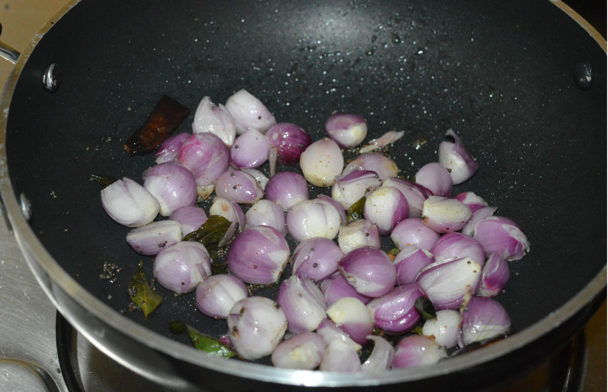 Step three: Add small onions. Increase heat. Saute it for 2 minutes. Reduce the heat to medium.